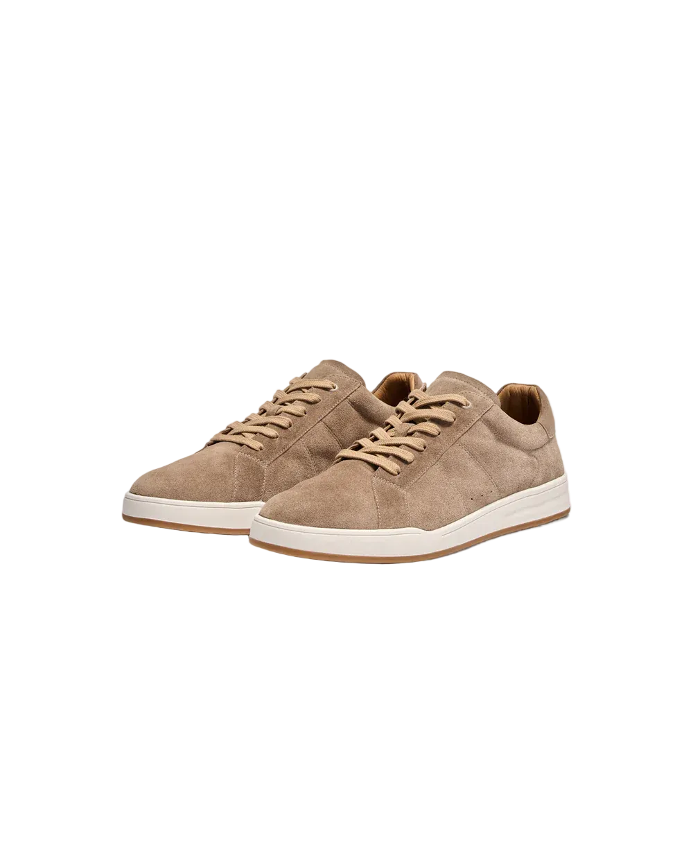 Pair of beige sneakers on a light gray background
