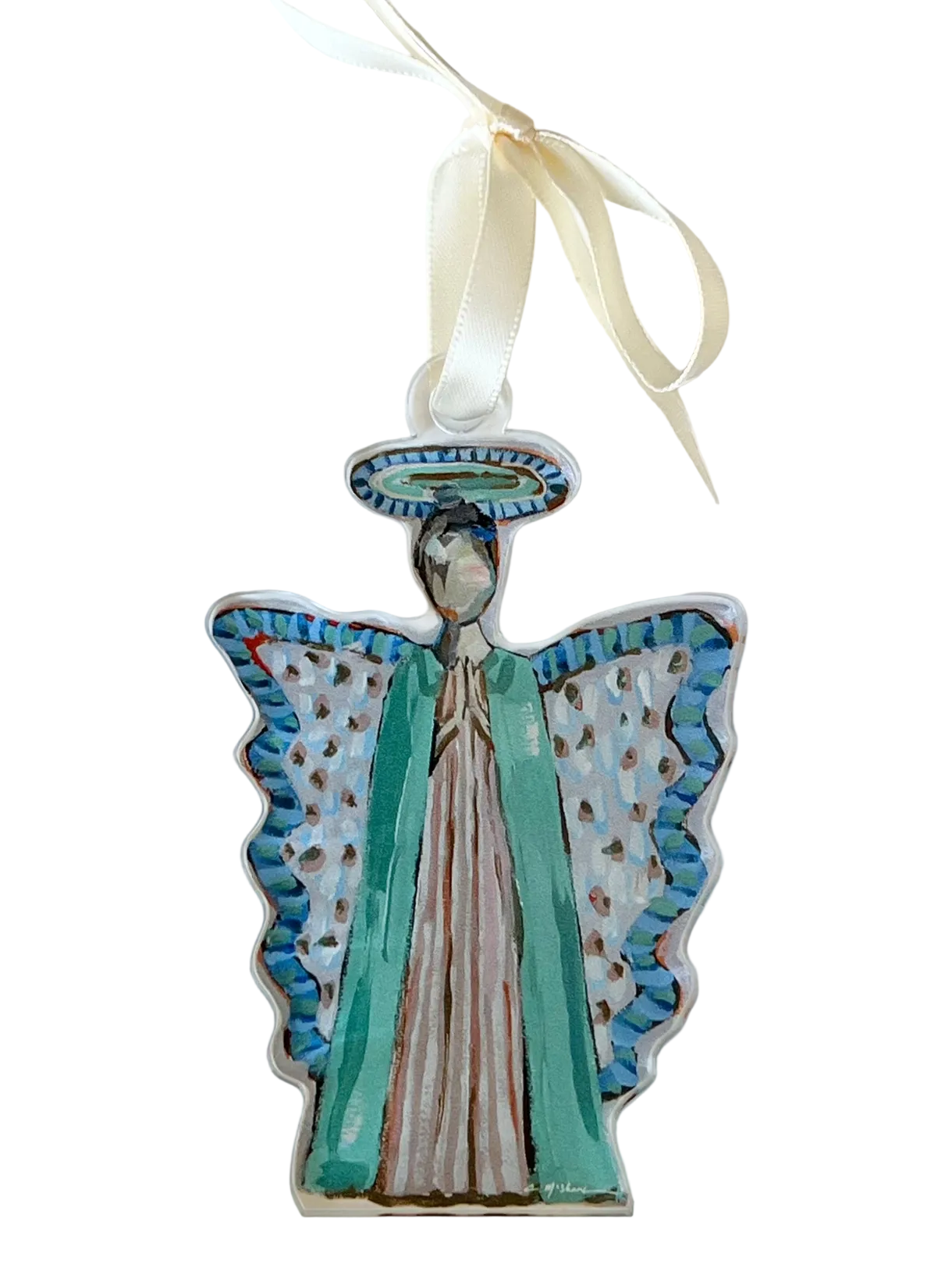 Ceramic angel ornament with blue wings and green robe on a white background