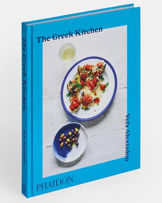 Book titled 'The Greek Kitchen' by Phaidon on a white background