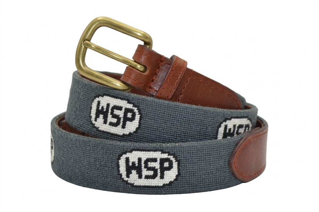 Gray widespread panic belt with brown leather strap and gold buckle on a white background 