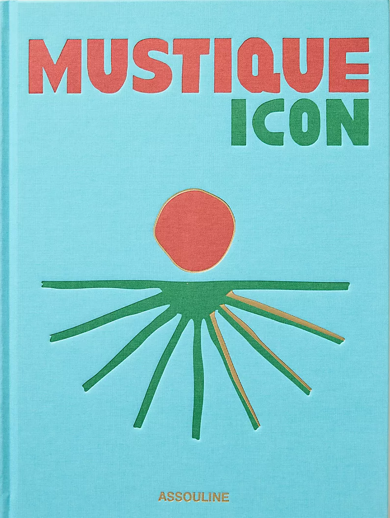 Book titled 'Mustique Icon' with a colorful cover on a light background