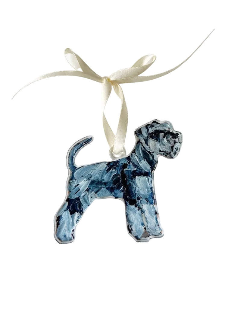 Decorative dog ornament with a blue pattern on a white background