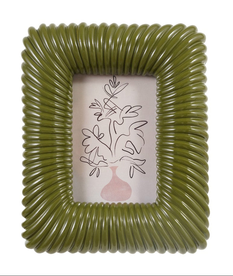 Green ribbed picture frame with a white background
