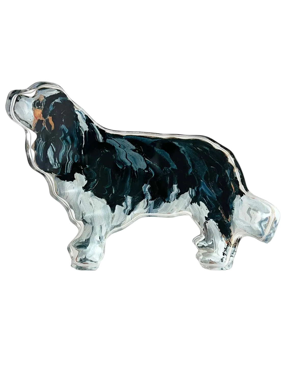 Glass sculpture of a dog on a white background