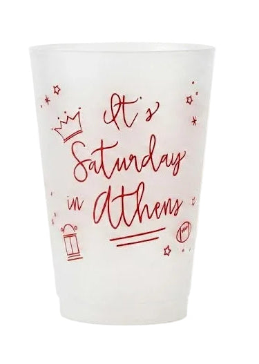 White tumbler with red text on a white background