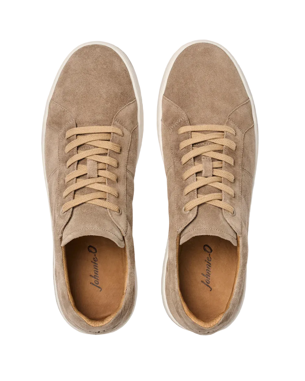 Pair of tan suede sneakers on a white background