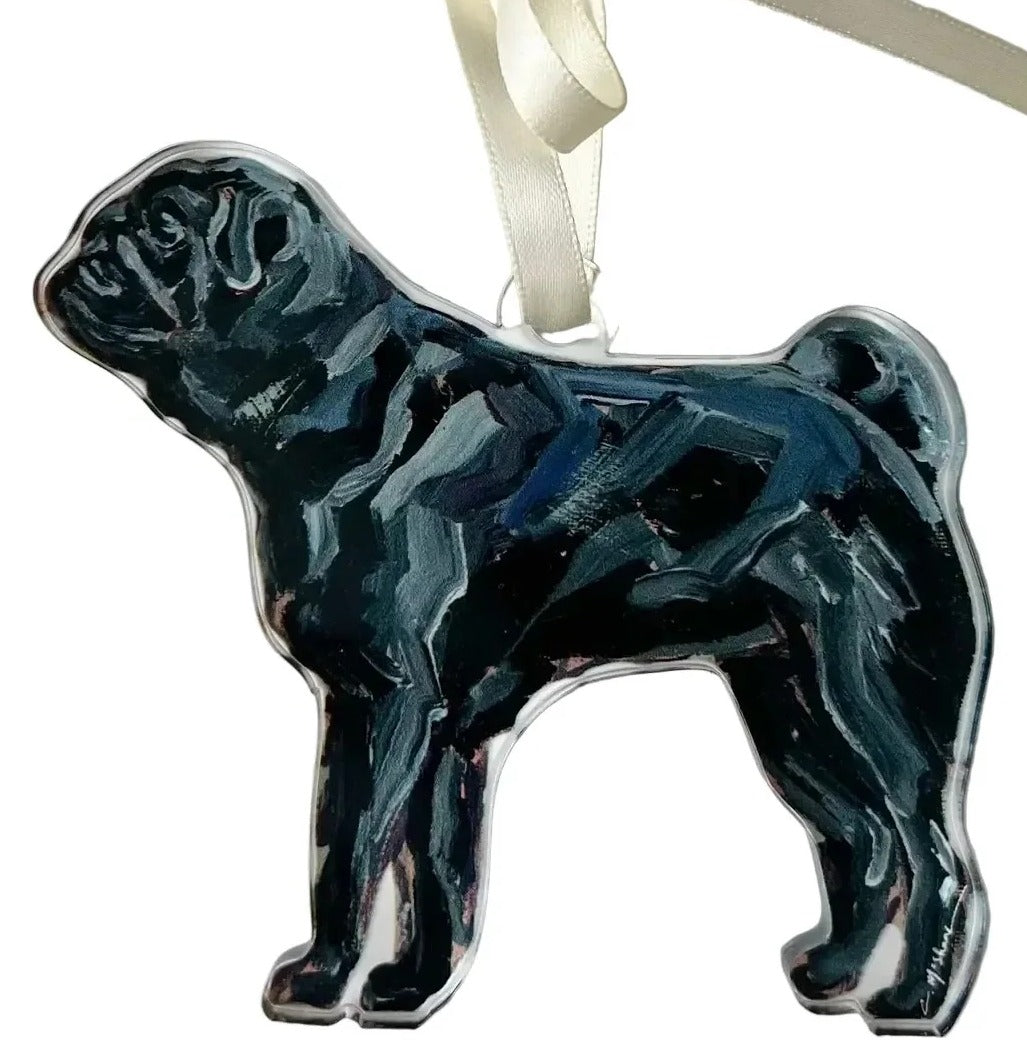 Decorative ceramic pug ornament on a white background with a ribbon.