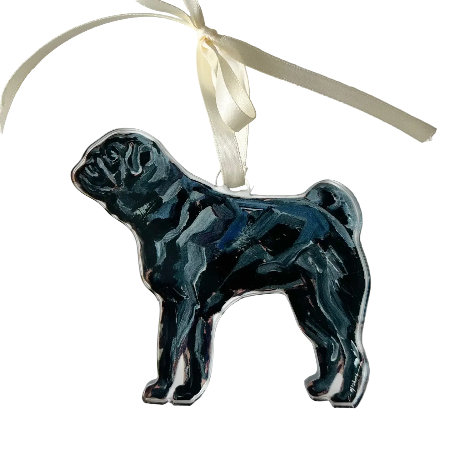 Decorative ceramic pug ornament on a white background with a ribbon.