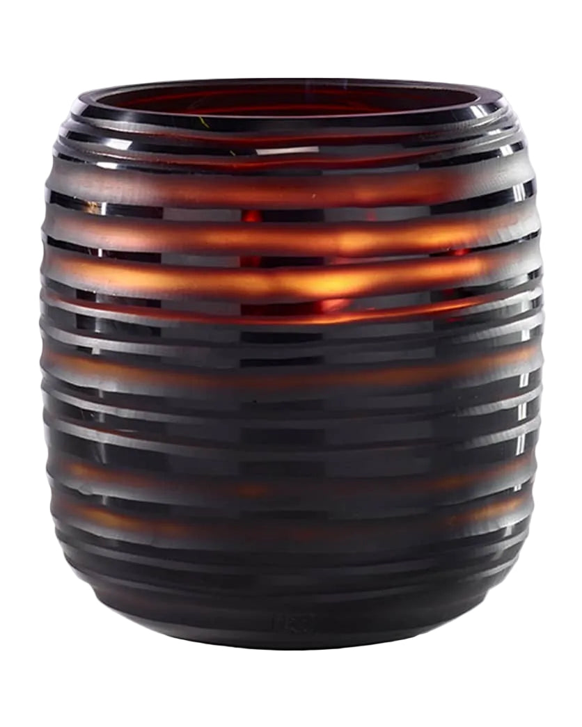 Decorative vase with striped pattern on a white background