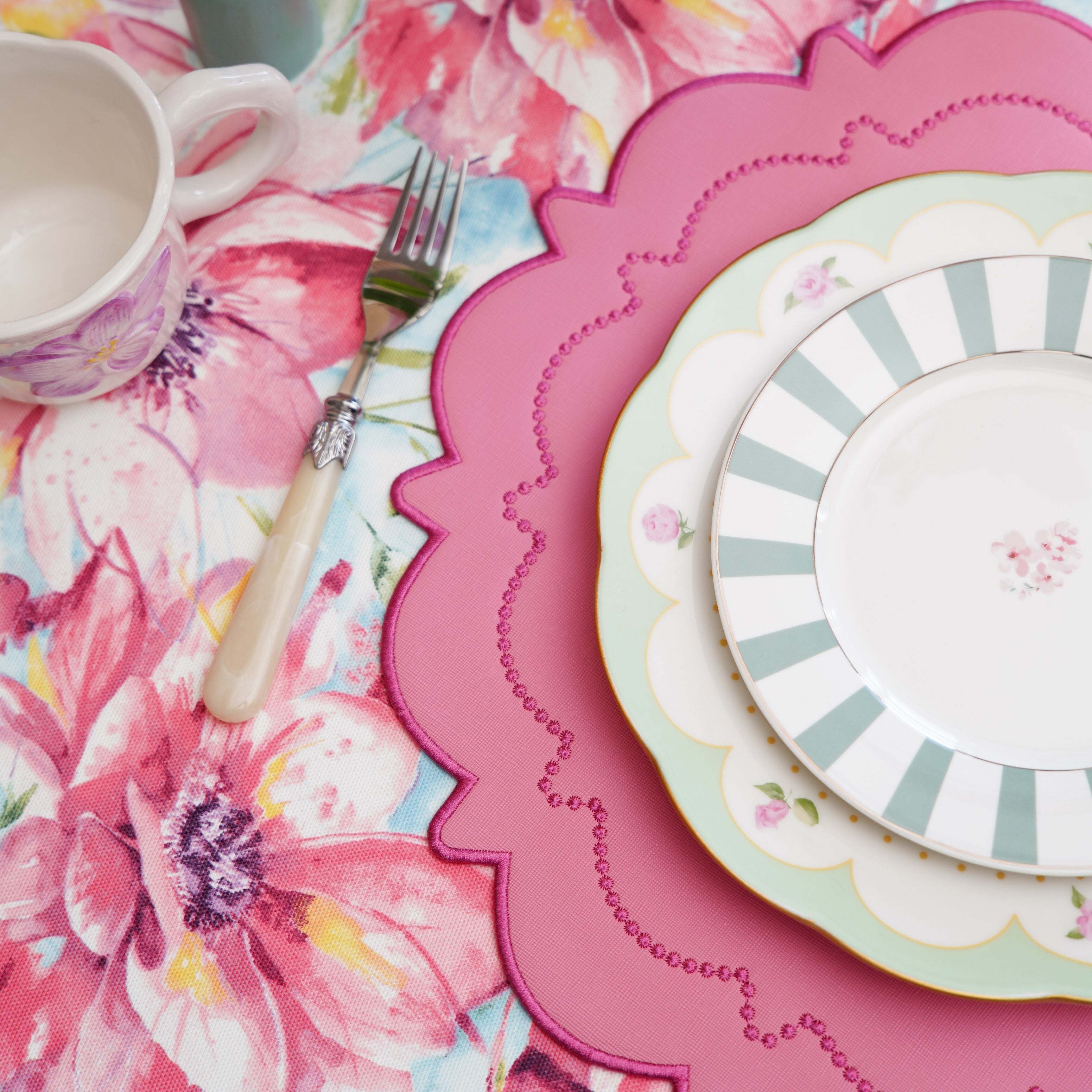 Solstice Pink Scalloped Faux Leather Placemat