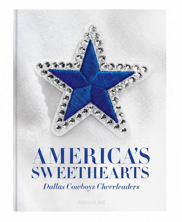 Blue star with decorative border on a white card with text