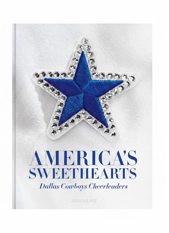 Blue star with decorative border on a white card with text