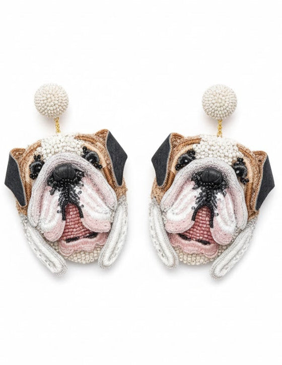 Bulldog face earrings with pearl accents on a white background