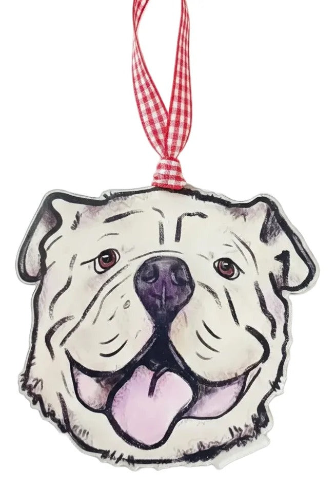 Decorative ornament with a bulldog face design on a marble surface