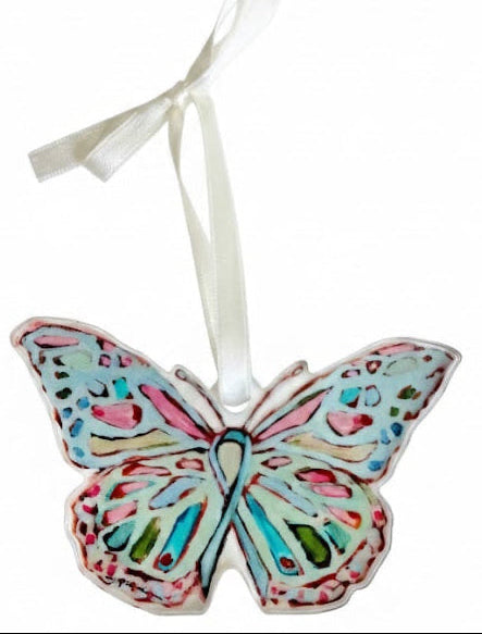 Decorative butterfly ornament with a ribbon on a white background